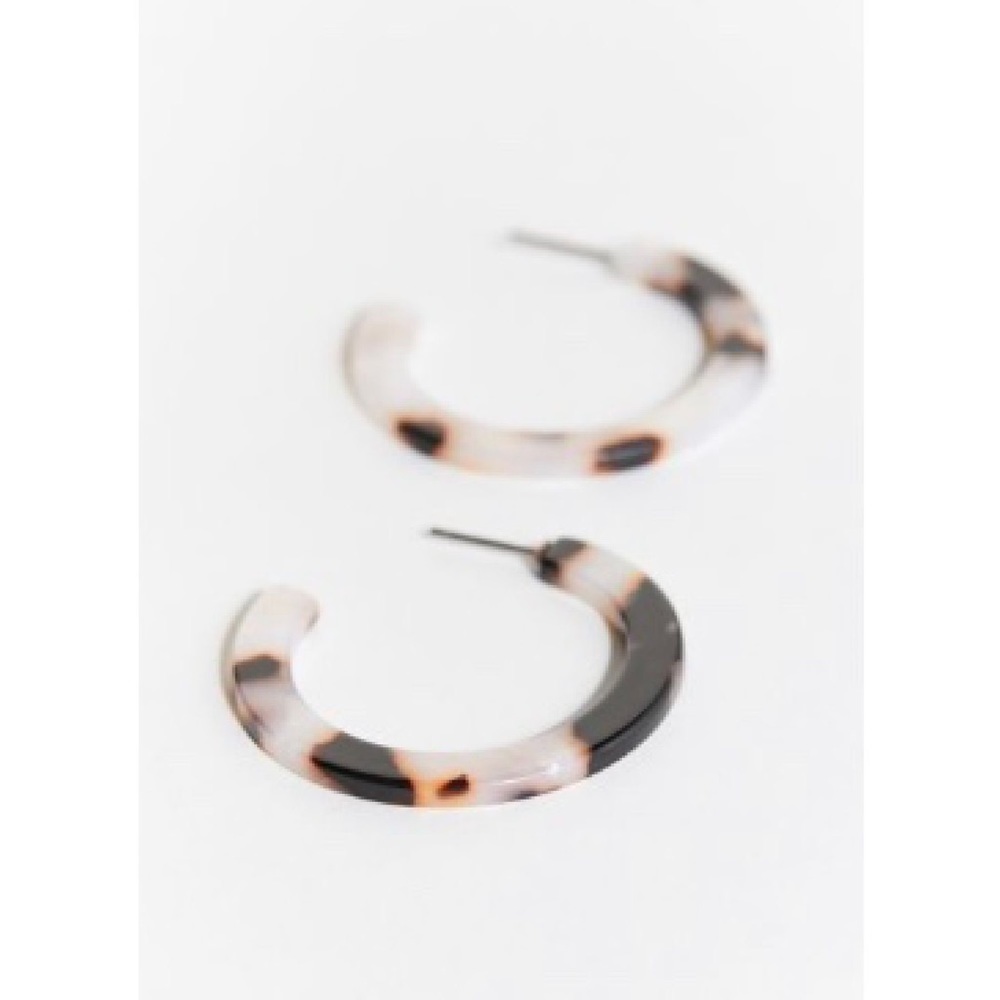 Urban Outfitters tortoiseshell hoop earrings.